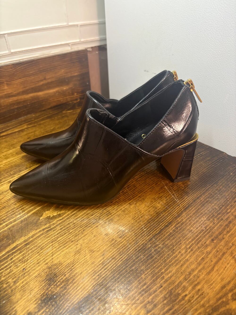 Vince Camuto black pointed toe heeled booties size 5.5